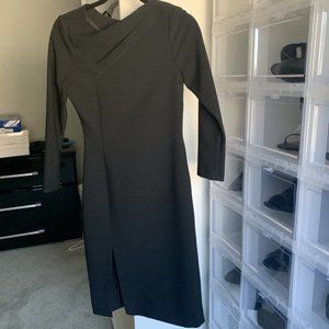 Black sheath dress with asymmetrical neckline